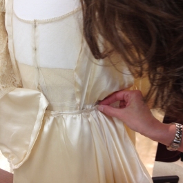 Sara secured the the skirt to waist tape and the side of the bodice.