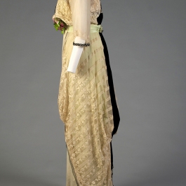 1912 silk and lace evening dress on the custom mannequin shown from the side. The slight tip forward would be created with the corset.