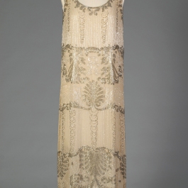 Evening dress of silk chiffon trimmed with silver and crystal bugle beads, KSUM 1983.1.330