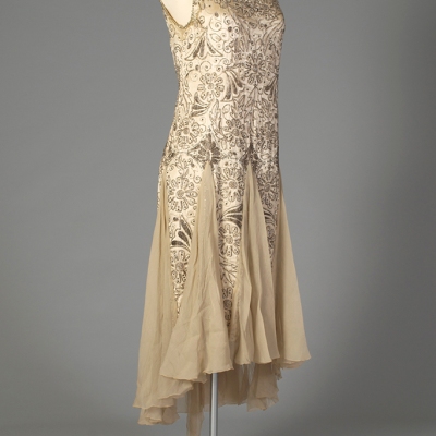Beaded evening dress of cream satin and chiffon, American, late 1920s, KSUM 1983.1.341.