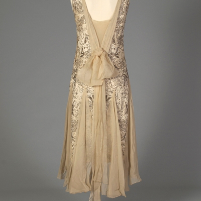 Beaded evening dress of cream satin and chiffon, American, late 1920s, KSUM 1983.1.341.