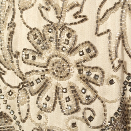 Detail of beading on evening dress of cream satin and chiffon, American, late 1920s, KSUM 1983.1.341.