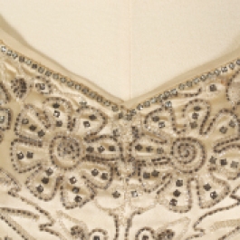 Detail of neckline on beaded evening dress of cream satin and chiffon, American, late 1920s, KSUM 1983.1.341.