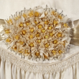 Waist detail showing artificial flowers and belt, on 'robe de style' wedding dress, KSUM 1989.59.1.