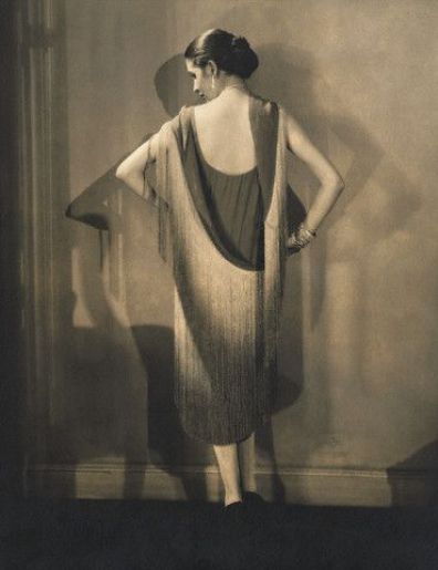 In this photograph the dress is unfastened but clearly shows how it drapes. Marion Morehouse in Chanel dress photographed by Edward Steichen
