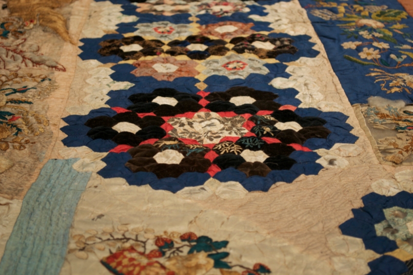 Detail of mosaic quilt, attributed to Elizabeth Hobbs Keckley, 1862-1880, dress and ribbon silk, KSUM 1994.79.1, Gift of Ross Trump in memory of his mother, Helen Watts Trump.